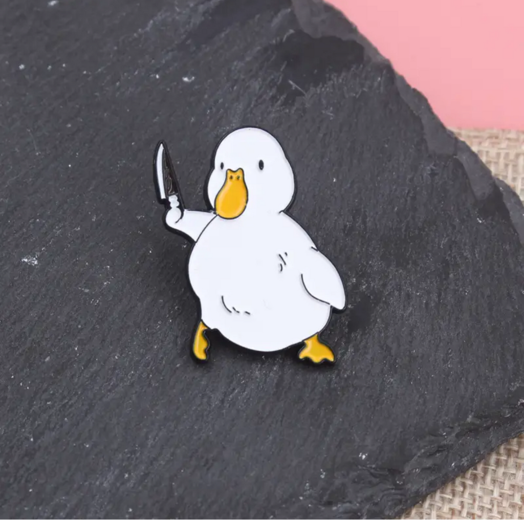 Pin's Canard Blanc Couteau