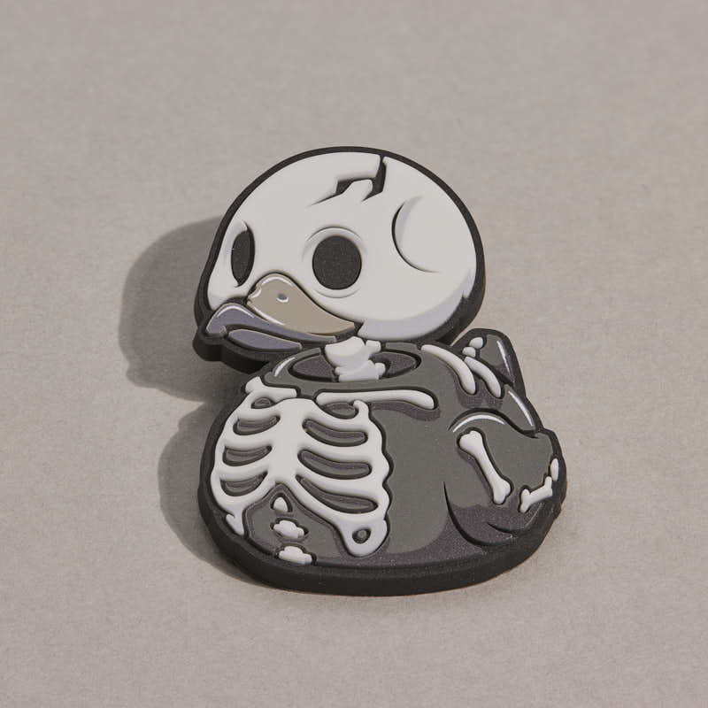 Pin's TUBBZ Numskull – Squelette phosphorescent