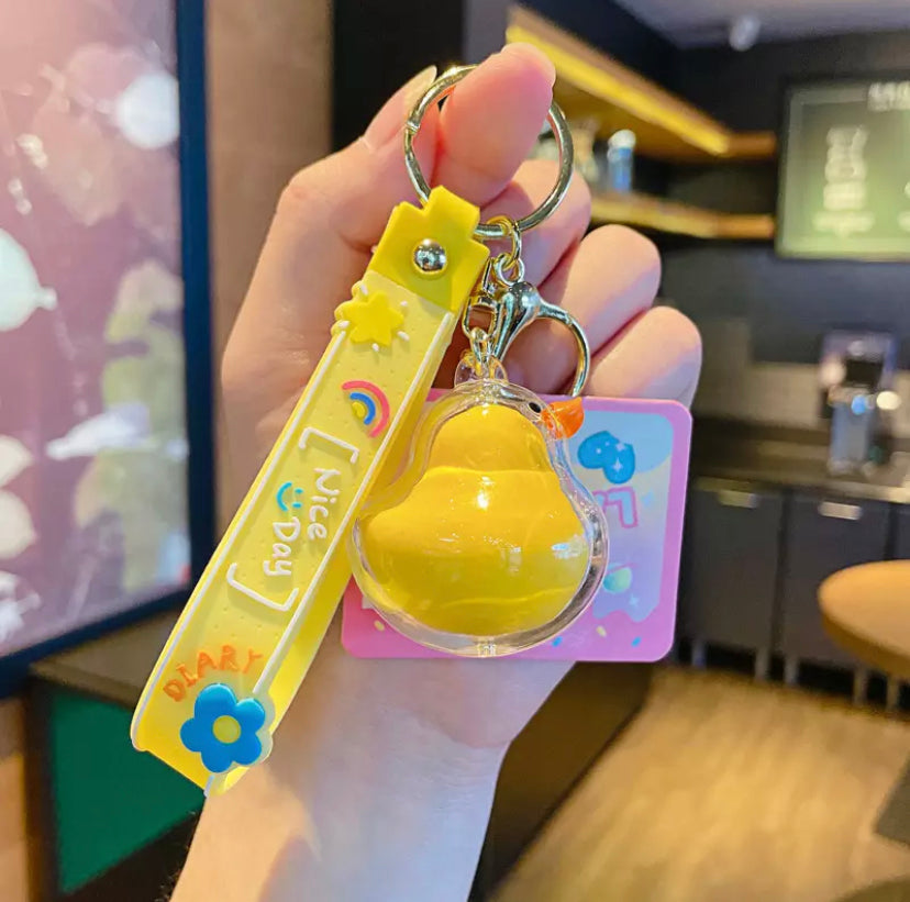 porte-cles-canard-jaune-en-boite